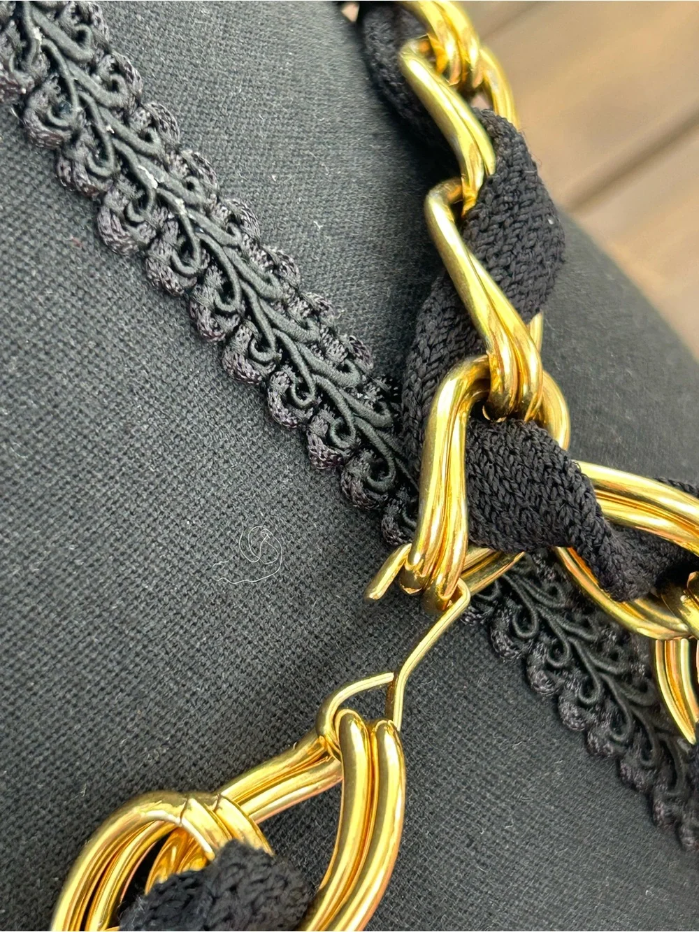 Couture style chunky gold tone and black textile woven chain belt
